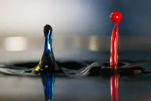 Split image for printing cost comparison: black and white vs colour prints. For screen readers and SEO, short, descriptive, purposeful.