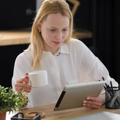 Lancashire professional uses a tablet to maximise digital document management benefits and streamline SME paperwork.
