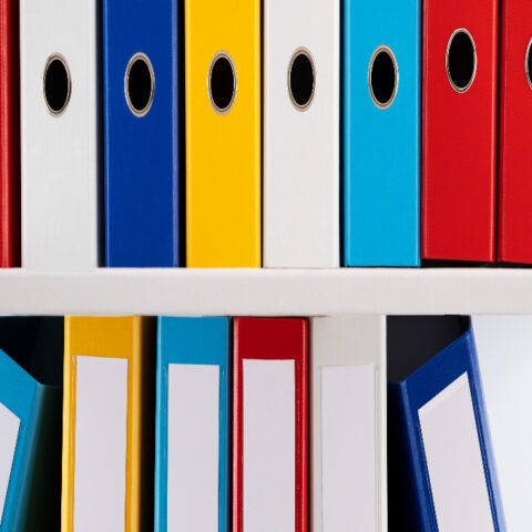 Organised filing system with colour-coded folders