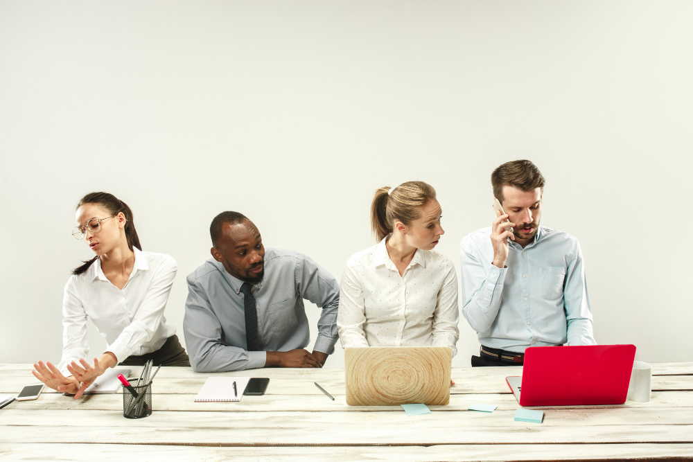 Office environment with employees working at computers