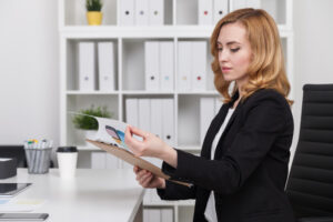 Office professional managing documents and schedules